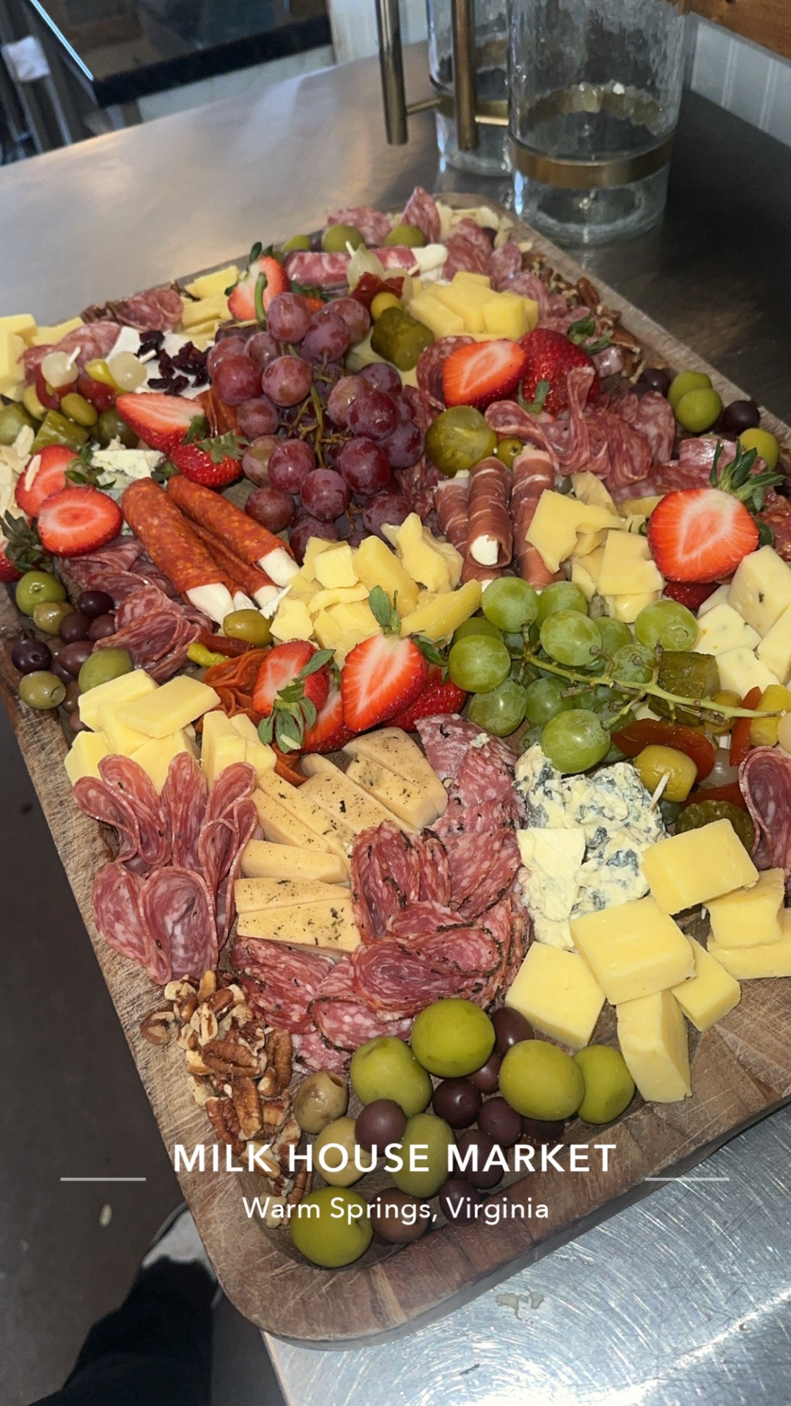 A colorful Milk House Market charcuterie platter